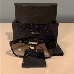 Prada black sunglasses with silver toned hardware